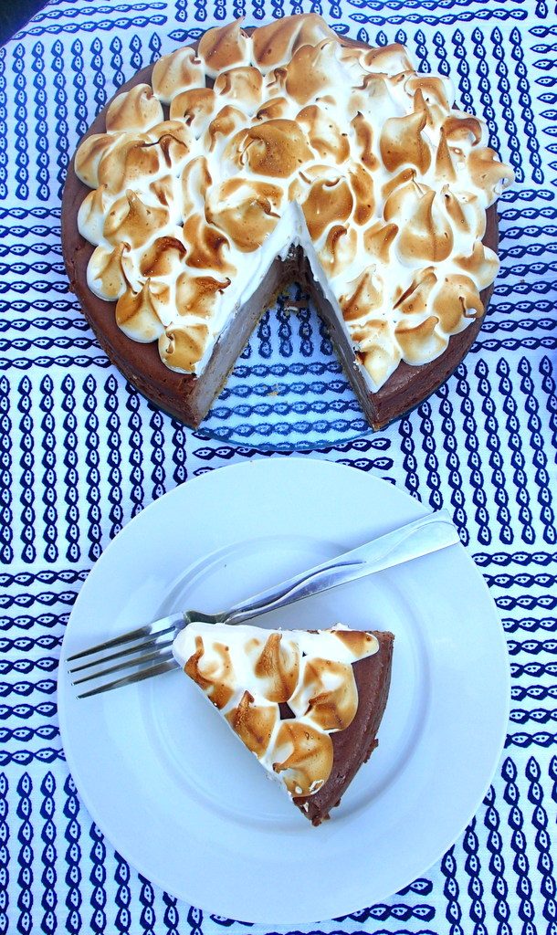 S'mores Cheesecake -  A classic graham cracker crust, caramel chocolate cheesecake, and a marshmallow meringue topping. From dirtydishclub.com
